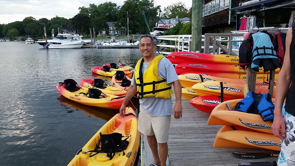 photo of William Lopez wearing a lifejacket at the side of a dock in June of 2014.